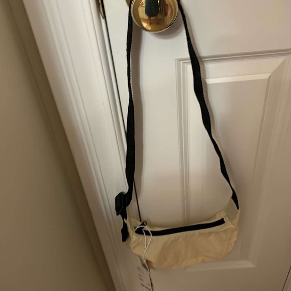 NEW BAGGU Mini Nylon Crescent Bag. Ivory. New with tags.